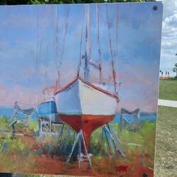 Many paintings from the Mackinaw City Area Arts Council Art Walk