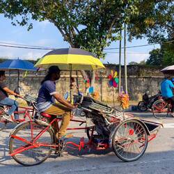 Tuk-tuks are around every corner — George Town, Malaysia.