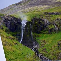 Waterfall in the wind at Grundafjordur