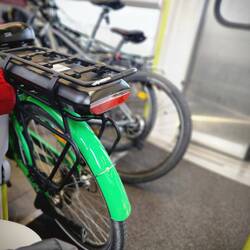 Bike rolled on to the train car this time! No help required!