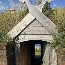 Entrance to sod house. Note the dragon carvings over the door.