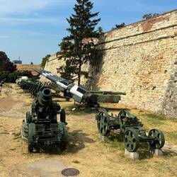 Military equipment display in the fort's moat