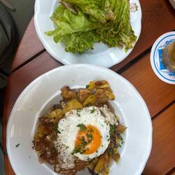 Gröslt: Potatoes, pan fried dumplings, roast pork and fried egg