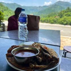 Lunch by the river as the bus making a pit stop