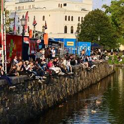 Culture aficionados burping and farting by the canal