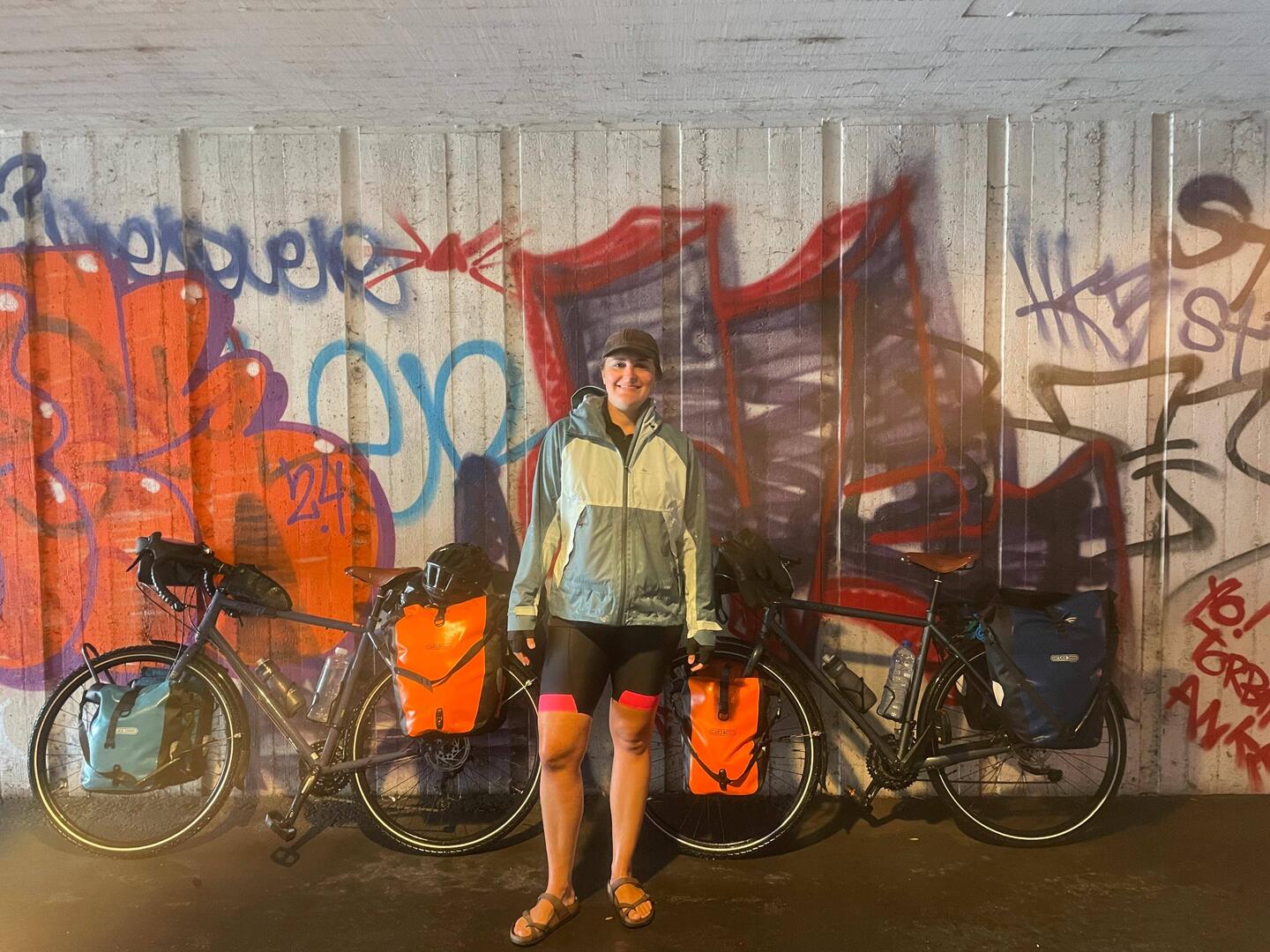 Sheltering in an underpass from the deluge of rain