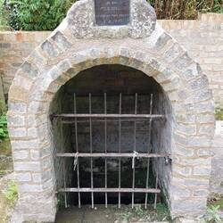 Holywell; The holy water well (actually a natural spring) is located next to the church)
