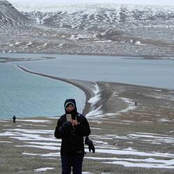 Is she taking a picture of me taking a picture of her?