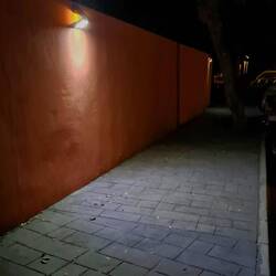 These point downwards and increase in brightness as you walk past