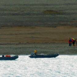 the expedition team checking out the site before canceling the visit