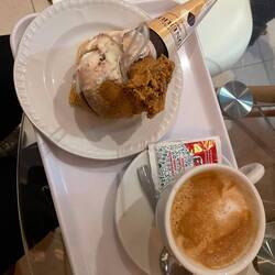 ice cream in a cornet, served on a plate