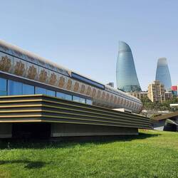 The carpet museum with the 3 Flame buildings in the background.