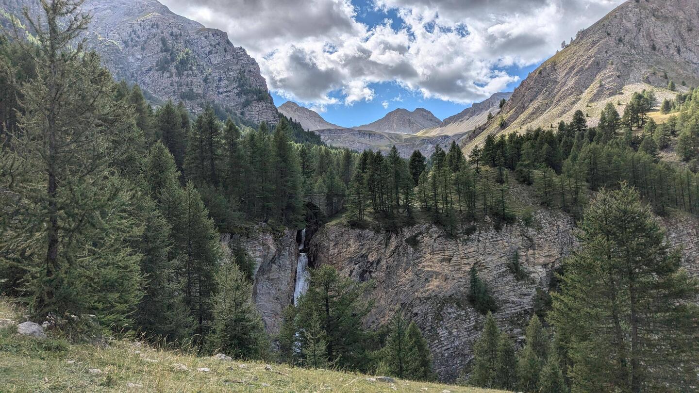Waterfall with the Col de la Cayolle