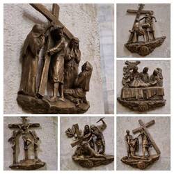 De bronzen staties op de pilaren van de kerk