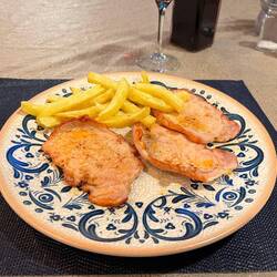 Lomo cerdo, or pork loins with patas bravas (although the latter seemed suspiciously like chips)