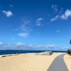 Once down, a carpet leading to the base of the dunes