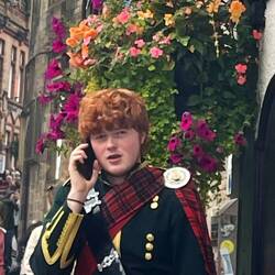 Fine young Scottish man in a kilt