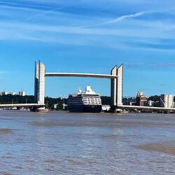 Pont Jacques Chaban Delmas rising to let a cruise ship through