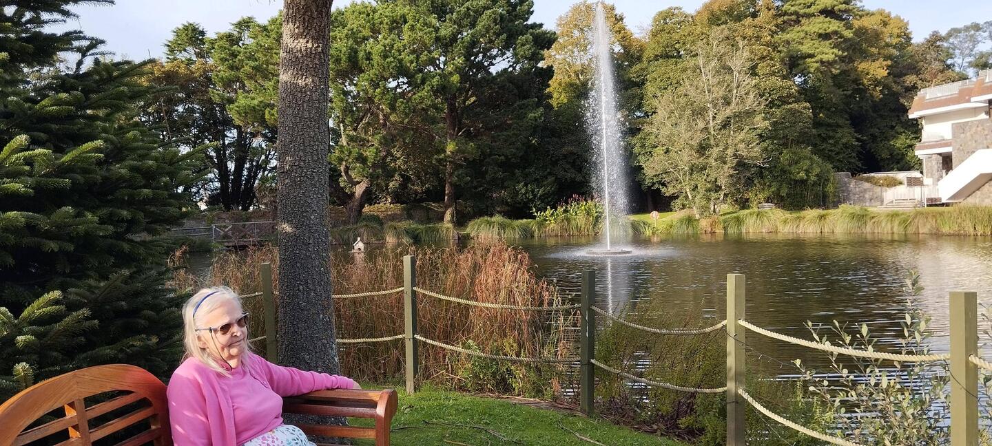 Relaxing by the hotel,s lake
