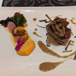 Beef filet topped with foie gras and truffles