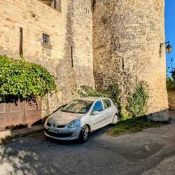 A defensive tower on the right and where the guards walk the walls at night on the left