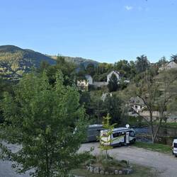 Village motorhome aire, is along side the river surrounded by rolling hills