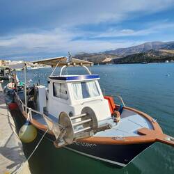 Local fishing boat having sold its catch