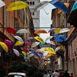 One of many streets strung with umbrellas around the city center.