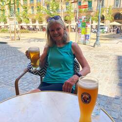Enjoying a mega beer in Plaça de la Independència, the main square