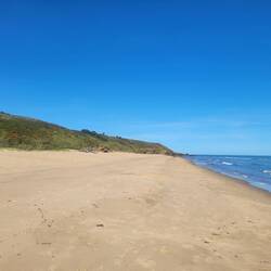 It was warm and sunny. It felt so good to have our feet in the sand