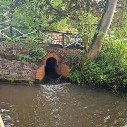 This bywater flowing past a lock had its very own tunnel. Cute!