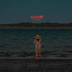 Supermoon competing with the cloud