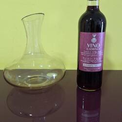 There was a complementary bottle of wine, though the decanter said to me it needed to breathe, a lot.