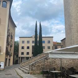 Trying to show how close our place is to the Basilica de Sant Felui - through the arc at the end