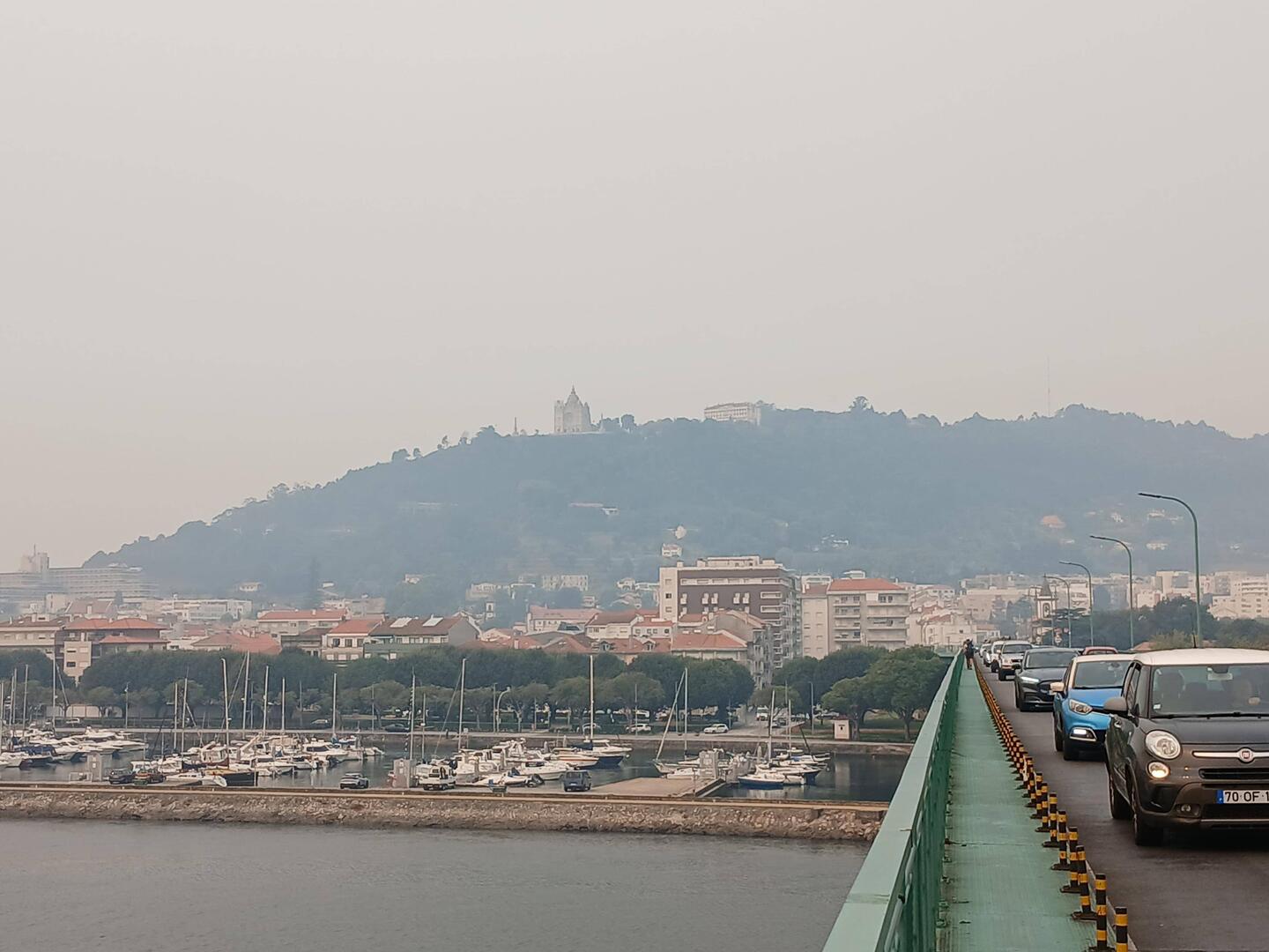 Crossing the bridge over rio Lima. The Cathedral is in the distance, on the left side of the hill.