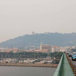 Crossing the bridge over rio Lima. The Cathedral is in the distance, on the left side of the hill.
