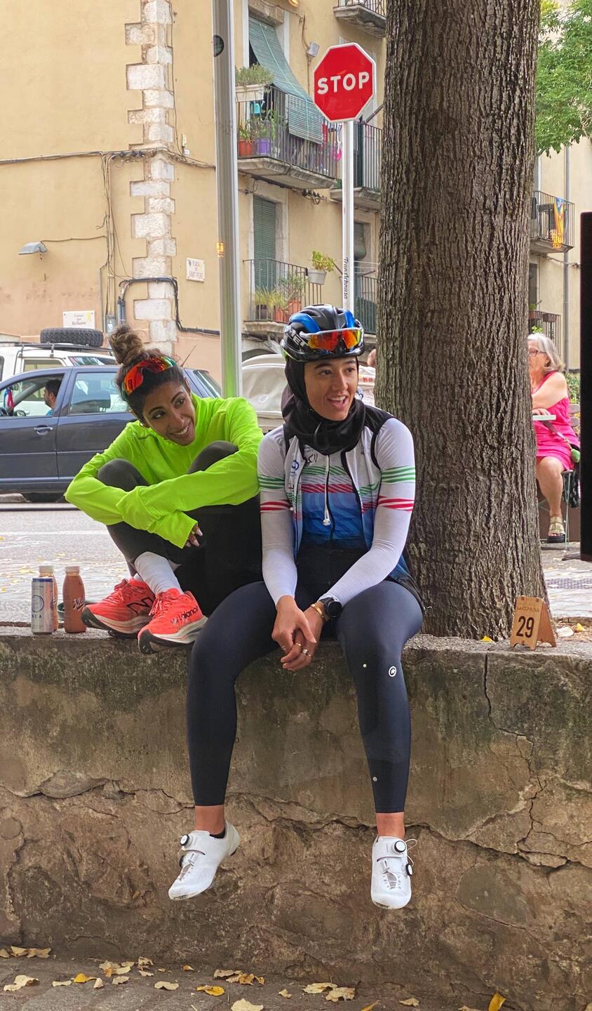 UEA girl in biking gear with her headscarf under her helmet