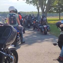 We were waiting here for traffic to clear and for the blockers to get in place. A very safe ride.