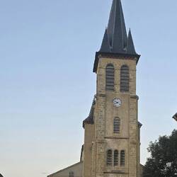 Village church stands by itself, just off the main village square