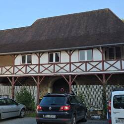 Some of the buildings have wooden balconies overlooking the streets