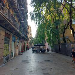 Pedestrian walkway lined with restaurants.