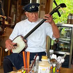 Pizza place owner entertaining us