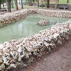 At first I thought the walls of this pool were made from skulls.