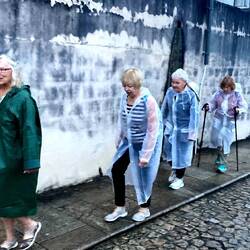 Walking in our new team uniforms - ponchos