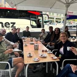 Our bike tour group having a well earned coffee and tart