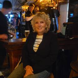 Sitting at the end of the bar watching all the action. The bartenders were hilarious.