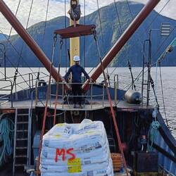 Labour intensive loading of fish food; we delivered 52 tonnes 😯