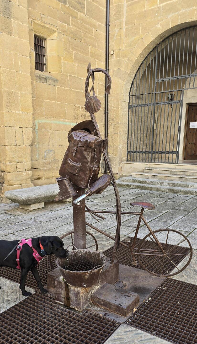 Niska inspecting a water fountain inspired by Pilgrim paraphernalia