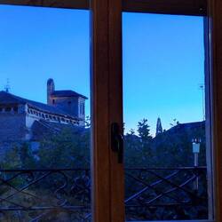 The view from our bed, one of the town's 3 churches.