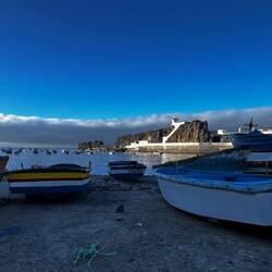 Boats in CámRa da Lobos.